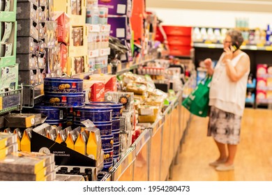 Sydney, Australia 2019-11-22 A Senior Woman Surveying Special Buys Aisle At ALDI Supermarket.Selective Focus