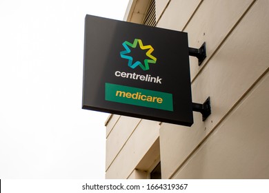 Sydney, Australia - 2019-12-24 Medicare And Centrelink Sign Outside Of A Building. Centrelink Is An Australian Government Agency That Administers Medicare And Disability Insurance Scheme