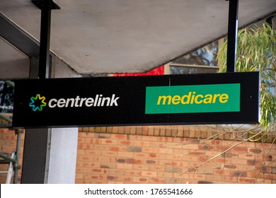 Sydney, Australia - 2019-12-24 Medicare And Centrlink Sign Outside Of A Building. Centrelink Is An Australian Government Agency That Administers Medicare And Disability Insurance Scheme