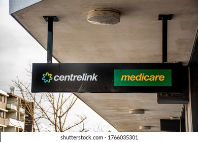 Sydney, Australia - 2019-12-24 Medicare And Centrlink Sign Outside Of A Building. Centrelink Is An Australian Government Agency That Administers Medicare And Disability Insurance Scheme