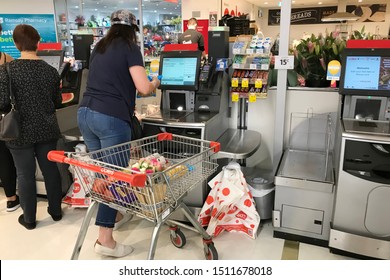 Sydney / Australia 2019-21-09. Customers At Self Serve Checkout InColes Supermarket