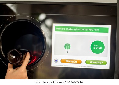 Sydney, Australia 2020-01-18. Return And Earn Public Return Point For Recycling. Reverse Vending Machine For Refund And Recycling Of Glass Bottles. Recycling