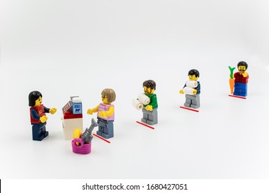 Sydney, Australia - 2020-03-23 Coronavirus social distancing concept. Minifigures staying in line at the supermarket trying to keep the distance. - Shutterstock ID 1680427051