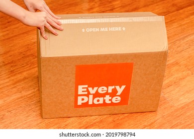 Sydney, Australia 2021-07-17 Hands Opening Every Plate Cardbord Box With Meal Kits. Subscription Delivery Meal Kit Service.