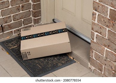 Sydney, Australia - 2021-10-30 Amazon prime box delivered to a front door of residential building. Black Friday Cyber Monday Christmas Sale Prime Day