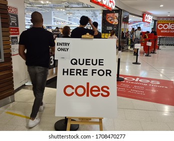 Sydney, Australia Apr 13 2020: Social Distancing Notice Sign At Coles Supermarket Telling Shopper To Stand Apart For At Least 1.5 M And Queue To Enter To Stop Spread Of COVID-19 Virus Global Pandemic