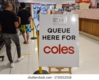 Sydney, Australia Apr 13 2020: Social Distancing Notice Sign At Coles Supermarket Telling Shopper To Stand Apart For At Least 1.5 M And Queue To Enter To Stop Spread Of COVID-19 Virus Global Pandemic