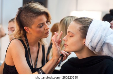 SYDNEY AUSTRALIA - APRIL 14 2015: Model Has Hairstyle, Manicure And Makeup During Lee Matthews Fashion Show Backstage At Mercedes Benz Fashion Week In Carriageworks Sydney Australia. 