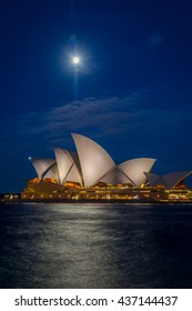 SYDNEY, AUSTRALIA - APRIL 19: View on Sydney Opera house with moon at night, long exposure. April 2016