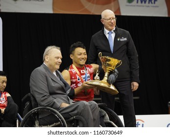 SYDNEY, AUSTRALIA - AUGUST 10, 2018: John Bishop, President Of The IWRF And The Honourable David Hurley  AC DSC (Ret'd) Governor Of New South Wales Present The Championship Cup To Japan.