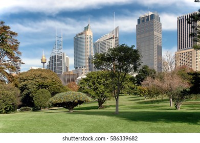 Sydney, Australia. Circa May 2005. Sydney Financial District Stands Next To Famous Botanical Gardens; Soft Focus