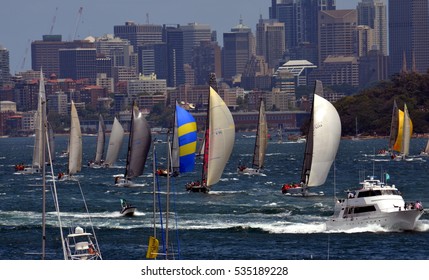 Sydney, Australia - December 26, 2012. Participants yachts in Sydney Harbour after the start. Sydney to Hobart Yacht Race is an annual event, starting in Sydney on Boxing Day and finishing in Hobart.