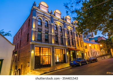 Sydney, Australia - December 29, 2014: Wine Odyssey Bar, By Night In The Rocks Streets, The Oldest District Of Sydney. And 'famous For Its Pubs, Restaurants, Hotels And Nightclubs.