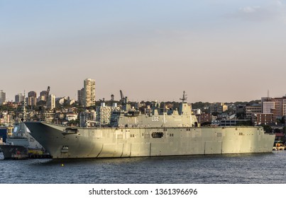 Sydney, Australia - February 12, 2019: Closeup Of L02 Navy Ship At Royal Australian Navy Heritage Centre With Housing In Back Under An Evening Twilight Sky.