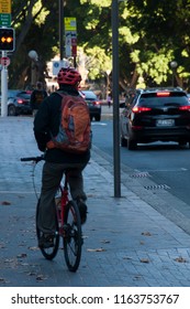 Sydney Australia Jun 17 2018, Bicyclist Taking Shortcut Along Footpath To Avoid Rush Hour Traffic