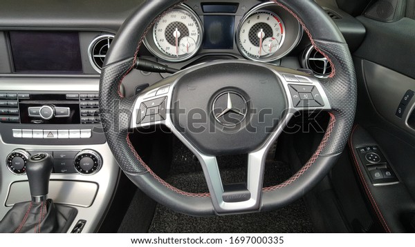 Sydney,\
Australia - Mar 2020: Interior car dashboard view of mercedes benz.\
A blend of luxury, sportiness &\
performance.