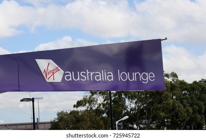 SYDNEY, AUSTRALIA – MARCH 11 2014: Virgin Australia Lounge Logo On Display Outside Sydney Airport's Domestic Terminal In The Departures Area.