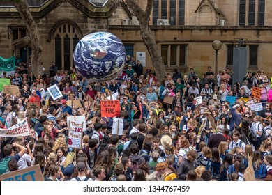 Sydney, Australia - March 15, 2019 - 20 000 Australian students gather in climate change protest rally, School Strike 4 Climate, and march from Sydney Town Hall Square to Hyde Park.
