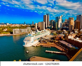 Sydney, Australia March 27, 2018 An Aerial Shot Of Sydney Harbor With A Royal Caribbean Cruise Ship Docked Near City Center.