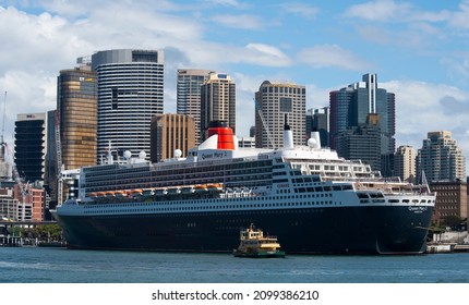 Sydney, Australia. March 5 2020: RMS Queen Mary 2 and the Sydney Skyline.