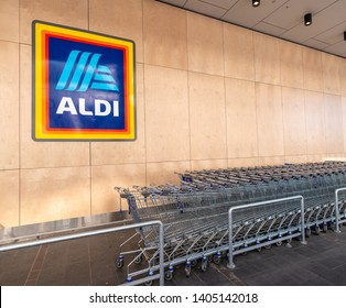 Sydney, Australia - May 13, 2019: Aldi supermarket shopping trolleys in front of an Australian Aldi store, that is part of the German Aldi group.