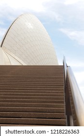 Sydney, Australia - October 20, 2018: Close Up Of Sail Of Sydney Opera House With Nobody On Stairs, Blue Sky And Clouds As Background.