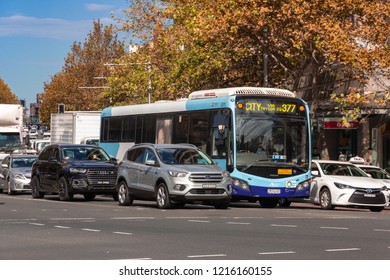 Sydney Bus Stopping And Waiting For Traffic Lights On The Street.one Of Sydney Public Transport,13/04/2018