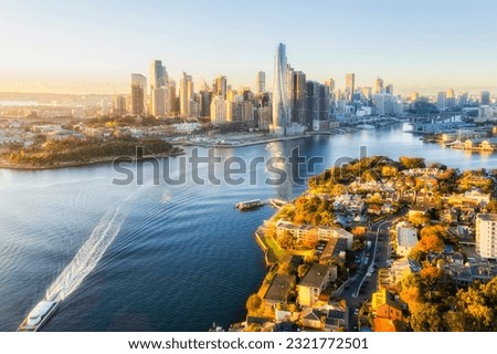 Sydney city CBD waterfront landmarks on harbour around Baragaroo towers - aerial cityscape.