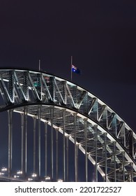 Sydney Harbour Bridge With Australia Flag In Half-mast.