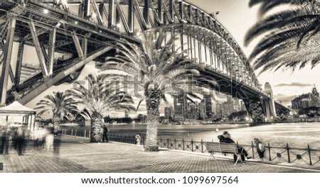 Similar – Happy woman looking at camera with Harbor Bridge in the background, in Sydney city, Australia.