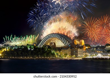 Sydney Harbour Bridge New Years Eve fireworks, colourful NYE fire works lighting the night skies with vivid multi colours. Sydney fireworks