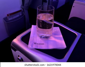 SYDNEY TO MELBOURNE, AUSTRALIA FLIGHT – DECEMBER 15 2019: Virgin Australia Flight VA800 Serves Sparkling For Business Class Passengers, Even On Early Morning Departures.