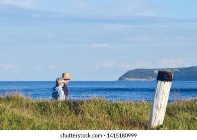 Sydney, New South Wales, Australia. June 2019. People Walking At Long Reef In Sydney.