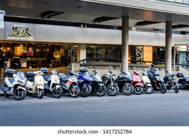 Sydney, New South Wales, Australia- 19 April 2019: Motorbikes And Scooters Parked In Front Of  Musou Japanese BBQ Restaurant.