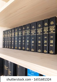 Sydney, New South Wales/ Australia - February 20 2020: Sets Of Australian Company Law Cases Books On A Wooden Bookshelves In Library