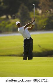 SYDNEY - NOV 11: American golfer Tiger Woods plays a fiarway shot on the 14th at the Emirates Australian Open at The Lakes golf course. Sydney, November 11, 2011