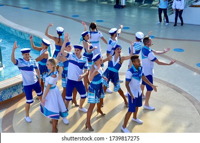 Sydney, Nova Scotia, CANADA - October 9, 2019: Sail-away Party And The Entertainment Crew Team Dressing Up On Site To Dance At The Open Deck Area Of The Princes Cruise Ship.