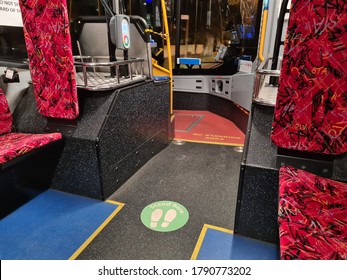 Sydney NSW Australia - 06 AUG 2020: Interior Of Empty Sydney Public Transport Bus. Green Sticker For People To Practice Space Social Distancing Between Passenger During Covid-19 Virus Pandemic. TfNSW
