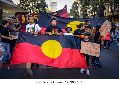Sydney, NSW, AUSTRALIA - April 10, 2021: Thousands of aboriginal protesters and supporters demand justice for black deaths in custody in a protest march through Sydney's CBD to The Domain.