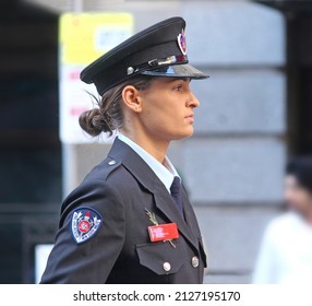 Sydney, NSW Australia - April 25 2021: Anzac Day March. Profile Of Female Fire Fighter In Formal Black Uniform And Hat. Fire And Rescue New South Wales