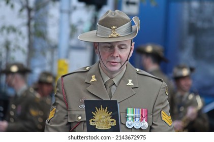 Sydney, NSW Australia - April 25 2021: Anzac Day March. A sergeant wearing uniform and slouch hat reading from a document. The Australian Army