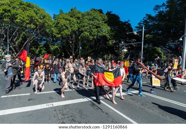 Sydney, NSW, AUSTRALIA - August 9, 2018: On World’s\
Indigenous Peoples Day, Indigenous rights protesters from all over\
New South Wales march under the banner \'Beyond Survival\' through\
Sydney CBD to 