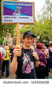 Sydney, NSW, Australia -February 22, 2020: A Person In The Crowd Holding A Slogan At The Rally For Climate Crisis Justice At Sydney Town Hall Demanding Action From The Australian Government.