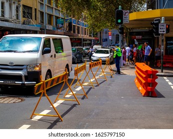 Sydney, NSW / Australia - Jan. 25 2020: Policeman Controls Traffic