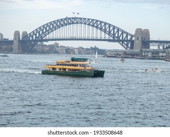 Sydney NSW Australia - January 26th 2020 - Pemulwuy Ferry Sailing Sydney Harbour And Harbour Bridge Background Blur On A Hazy Summer Afternoon Due To Bush Fire