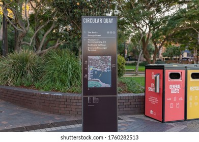 Sydney NSW Australia - June 16th 2020 -  Directional Sign at Circular Quay with Map and some waste bin background blur on a sunny winter afternoon