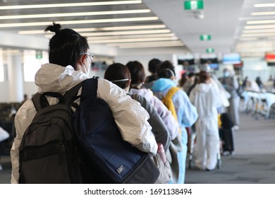 SYDNEY, NSW / AUSTRALIA - MARCH 28, 2020: Sydney Airport During COVID-19 Pandemic. People Try To Go Back To Their Countries And Protect Themselves From The Virus.