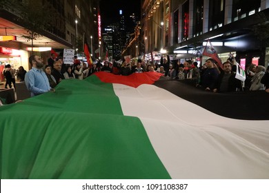 SYDNEY, NSW / AUSTRALIA - May 15, 2018: A Giant Palestinian Flag Is Carried Throughout The City At A Demonstration Held To Mark 70 Years Since The Palestinian Exodus (Nakba) In 1948.