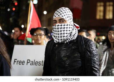 SYDNEY, NSW / AUSTRALIA - May 15, 2018: A Man With His Face Covered At A Demonstration Held To Mark 70 Years Since The Palestinian Exodus (Nakba) In 1948.