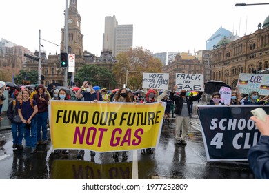 
Sydney, NSW, AUSTRALIA - May 21, 2021: . Tens of thousands young  Climate Change protesters outside Sydney's Town Hall take part in School Strike 4 Climate rally. 
